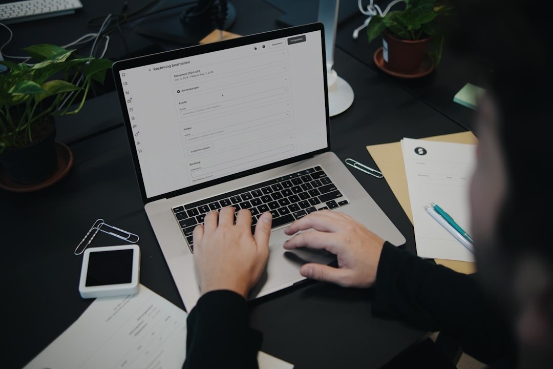 person writing blog on computer