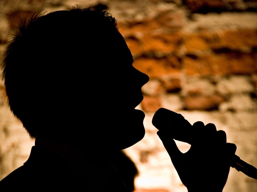 person speaking into microphone